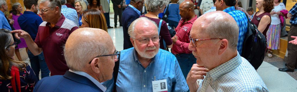 Photo of Alumni members in group conversation