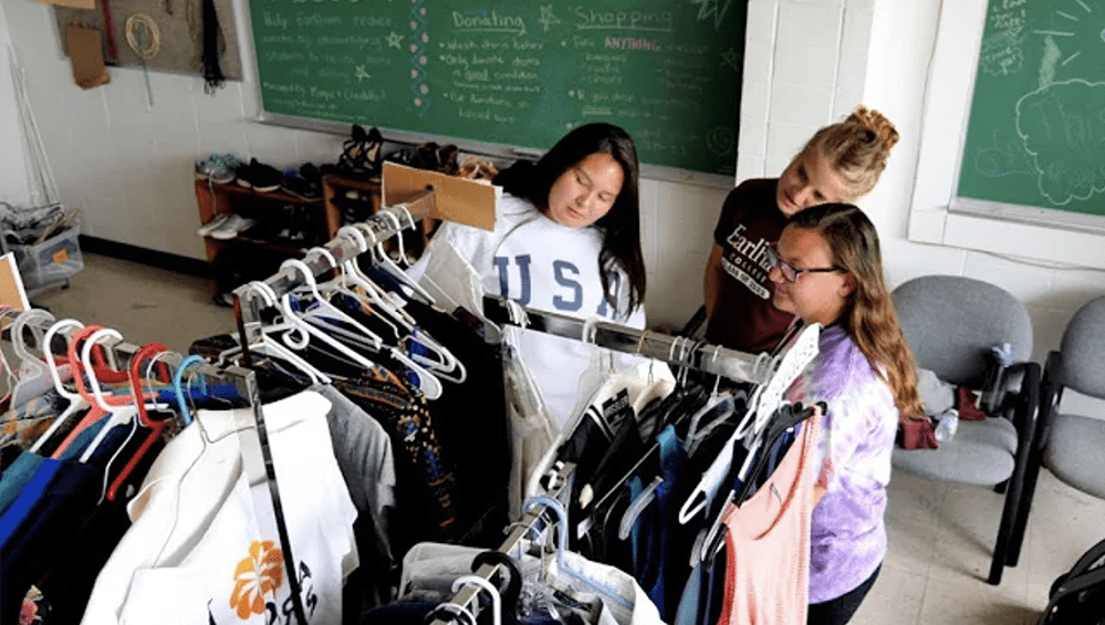 Female students looking at a free store