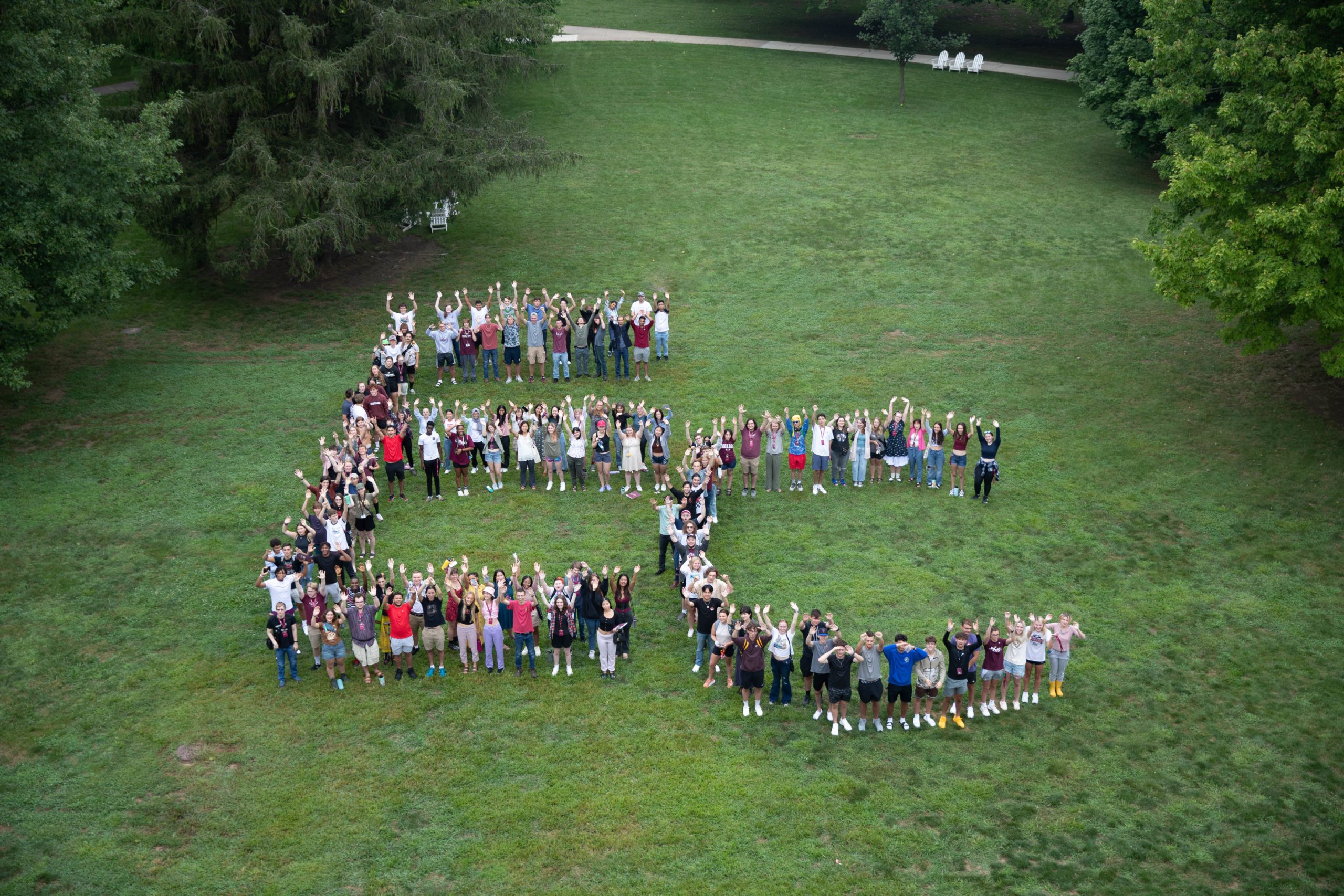 Hello EC! The Class of 2026 stands on The Heart for their New Student Orientation photo.