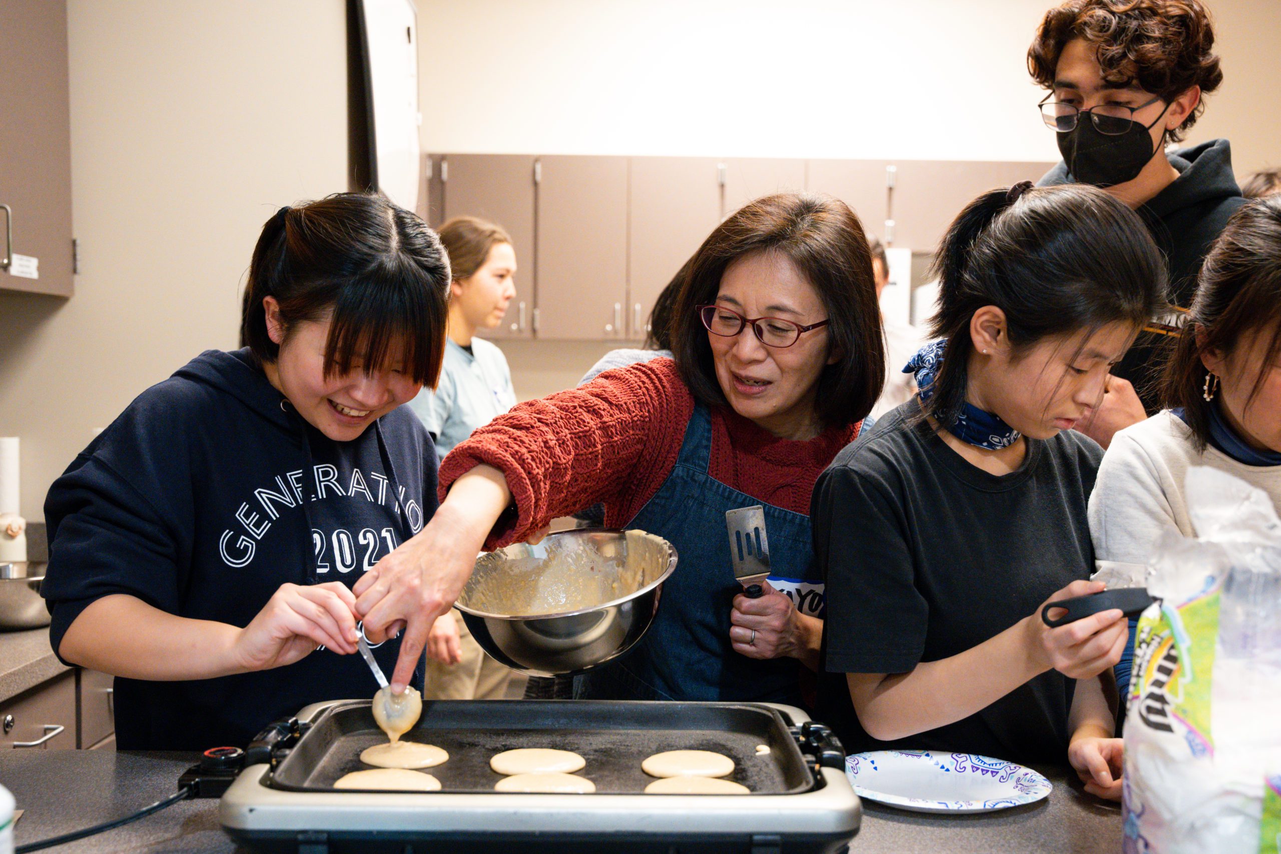 Students learn how to make doryaki, a traditional Japanese confection, at an event hosted by the Japanese Studies and Languages Department.