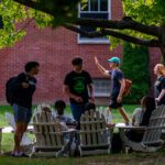 Students talk to each other during the first day of classes in fall 2023.