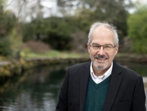 Paul Sniegowski in front of a small pond