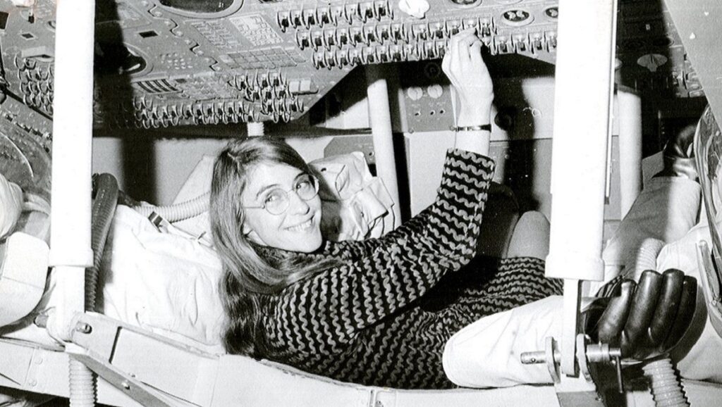 Margaret Hamilton black and white picture from a flight deck simulation.