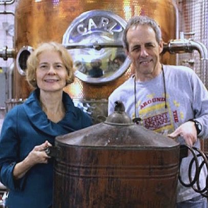 Esteban Arguedas holding an open container of strawberries