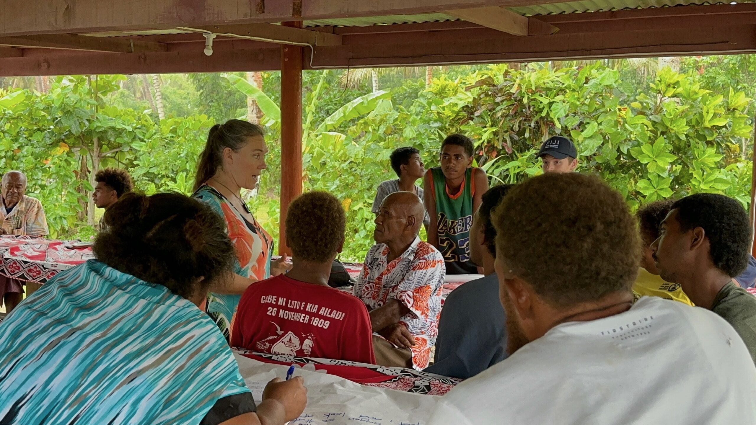 Heather Lerner stands in the middle of a community gathering