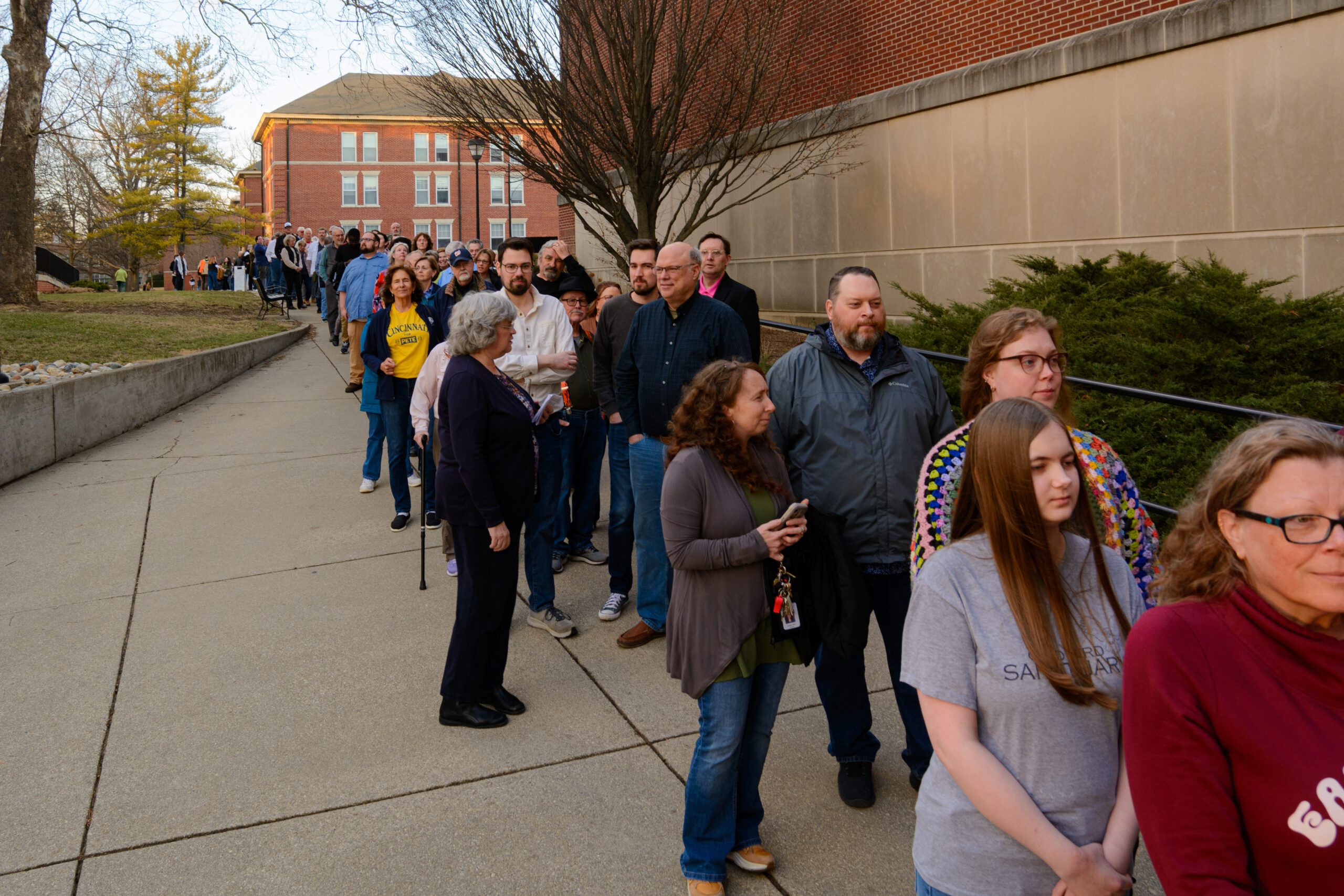 A line forms outside the Athletics and Wellness Center