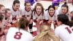 Earlham's volleyball team celebrates a victory in the conference tournament quarterfinals.