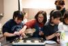 Students learn make doryaki, a traditional Japanese confection, at an event hosted by the Japanese Studies and Languages Department.